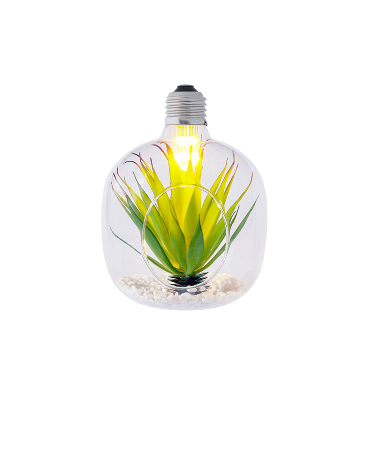 light bulb with plant decoration inside