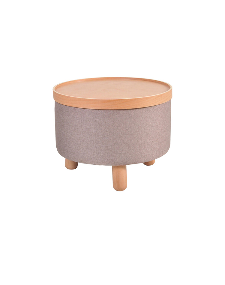 circular wooden stool wrapped in cloth with 3 wooden legs